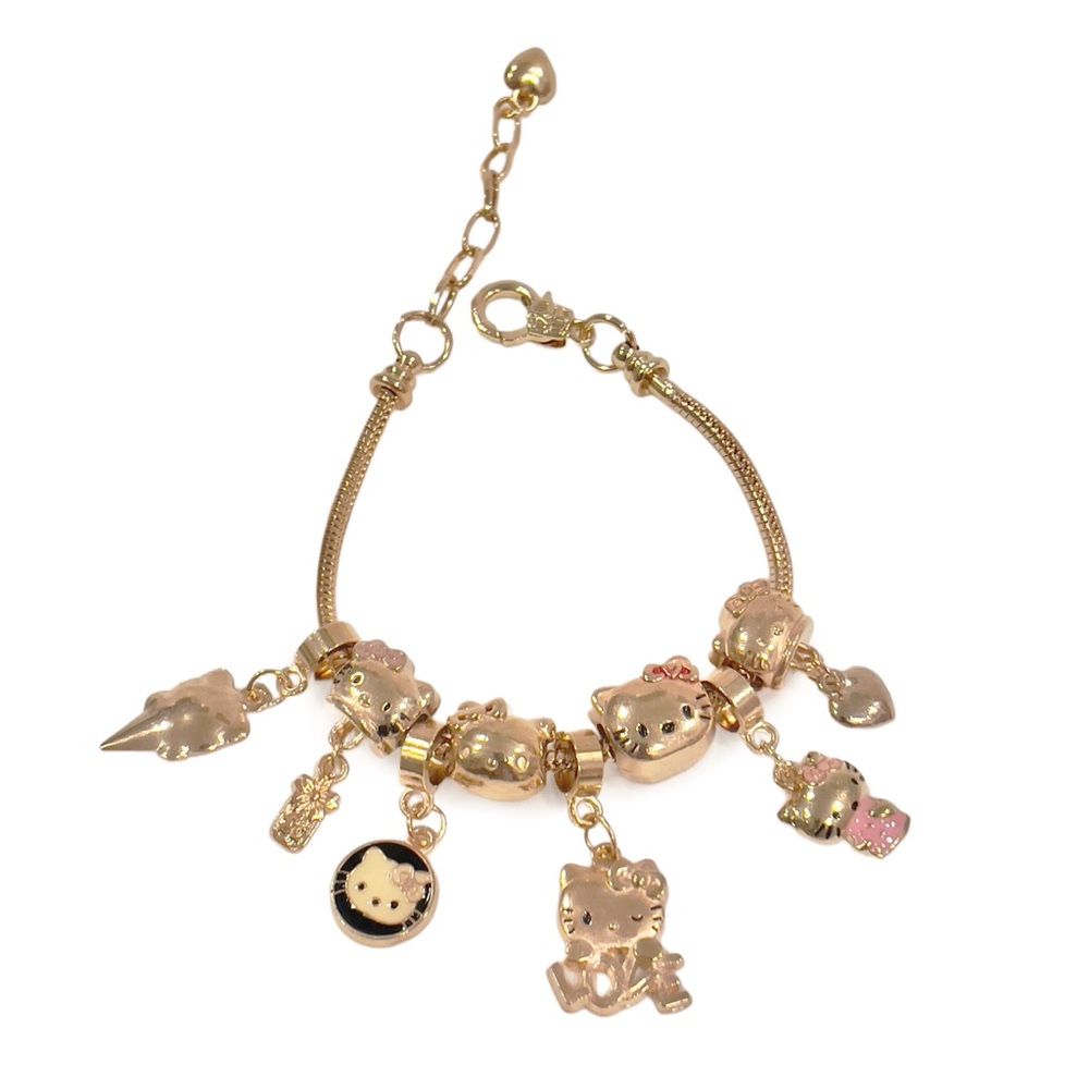 HELLO KITTY Charm Bracelet Adjustable Gold-Tone 8 Charms Included NWOT